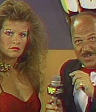 mean gene okerlund laughing during a promo